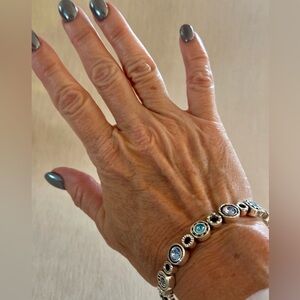 Brighton ‘Halo Burst’ hinged, silver plated with colored Swarovski crystals.